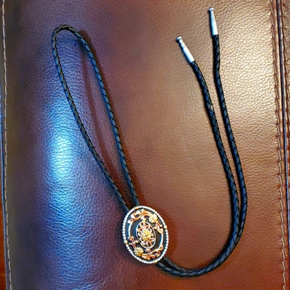 Bolo Tie with Decorative Medalion and Metal Tips